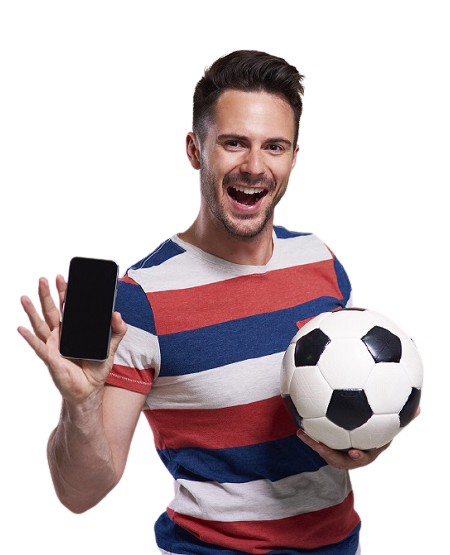 Excited man holding a ball and a phone in his hand